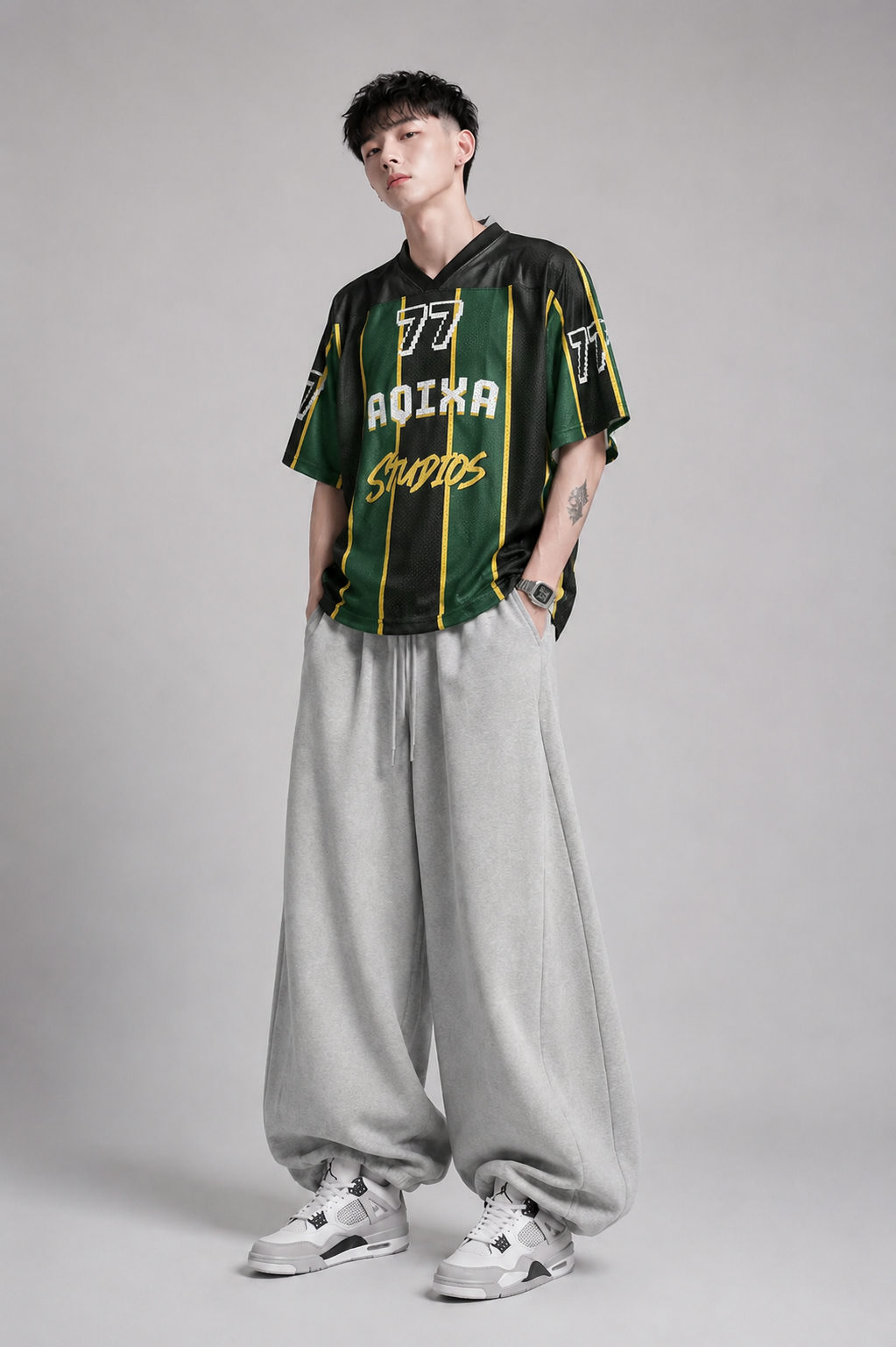 AQIXA 77 Mesh Football Jersey – Black/Forest Green